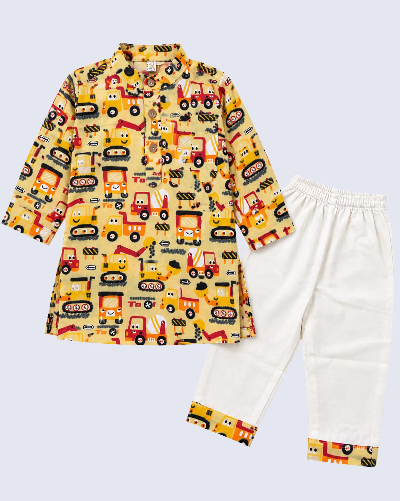 A children's two-piece pajama set featuring a long-sleeve top and pants. The top is yellow with an all-over cartoon construction vehicle print, and the pants are off-white with matching yellow printed cuffs.